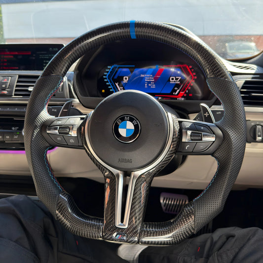 BMW carbon fibre flat bottom steering wheel with airbag included