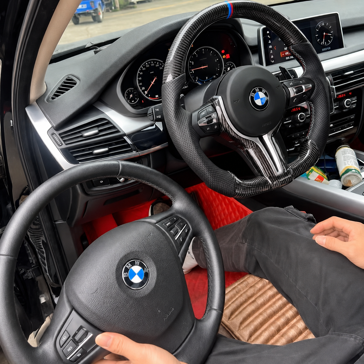 BMW carbon fibre flat bottom steering wheel, close-up of carbon fibre finish
