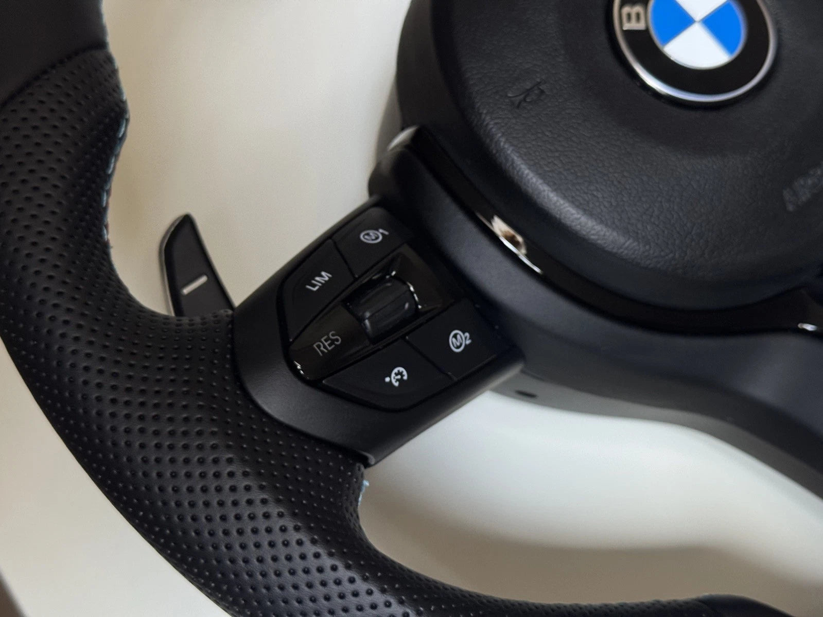 BMW M Sport flat bottom steering wheel, all-black leather with airbag and multifunction buttons included