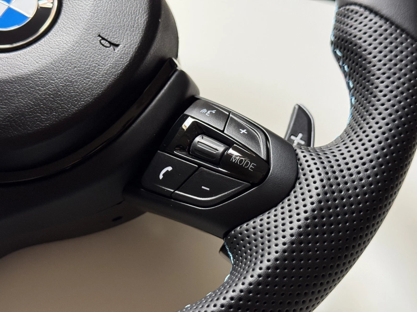 BMW M Sport flat bottom steering wheel, detail view of leather and flat bottom rim